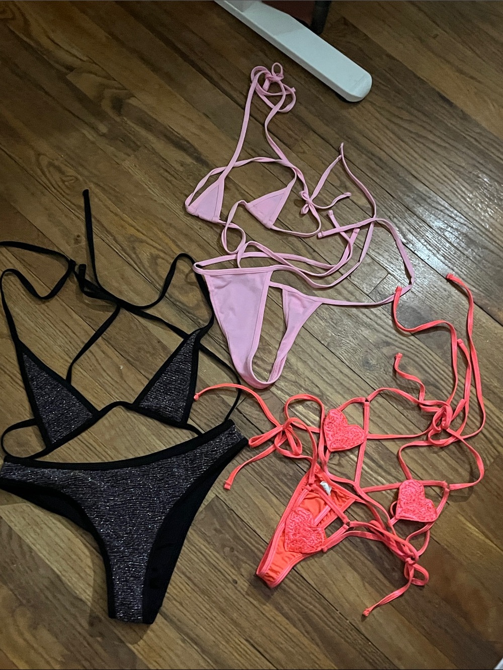 Set of three micro bikinis.